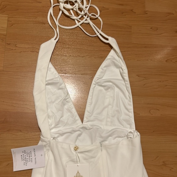 Brand new white halter gown with tie in back . Zipper in back with - Picture 11 of 15